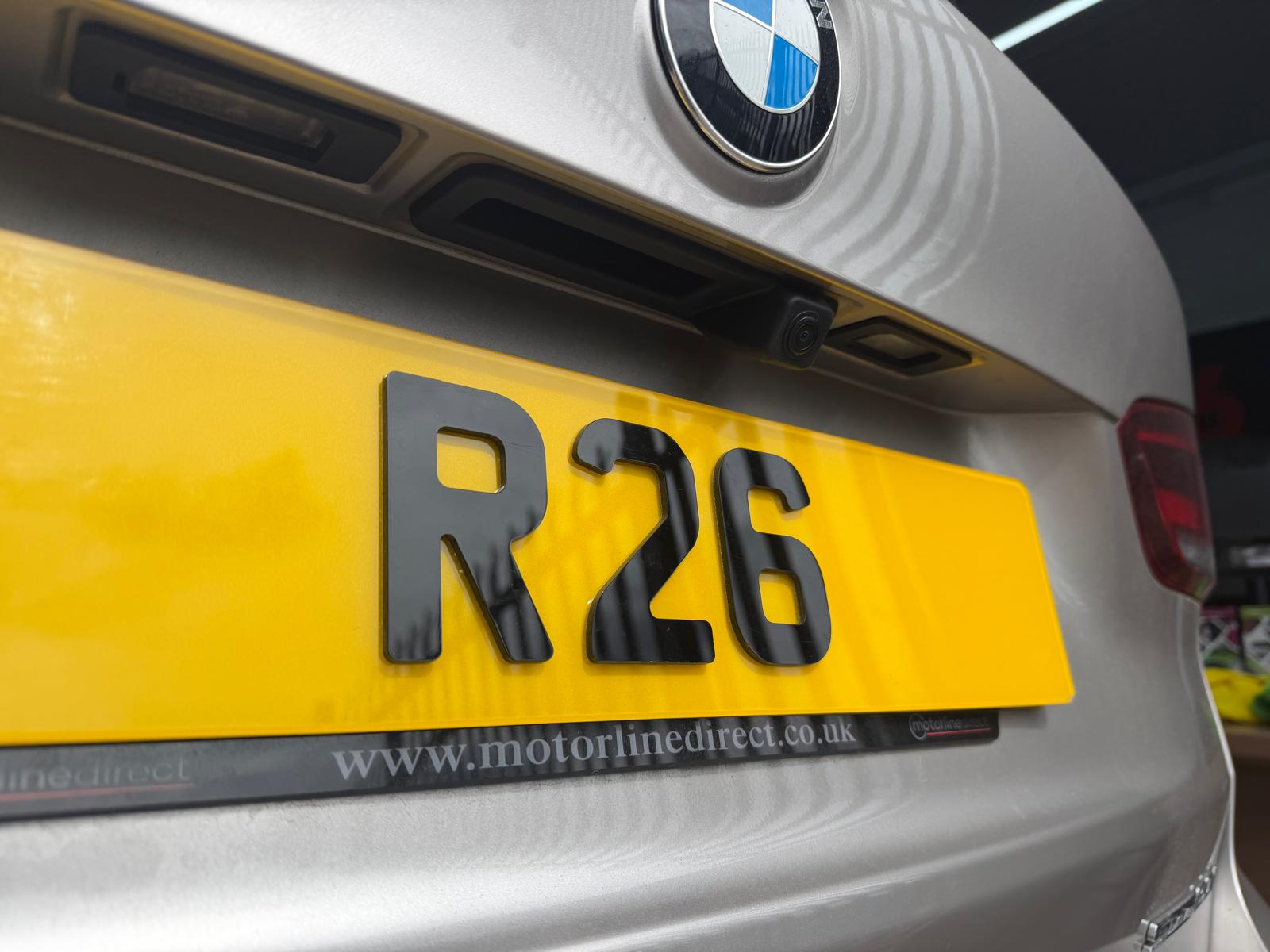 Reversing camera fitted neatly above a Volkswagen's number plate